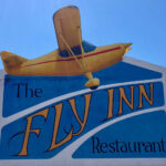 The Fly Inn logo